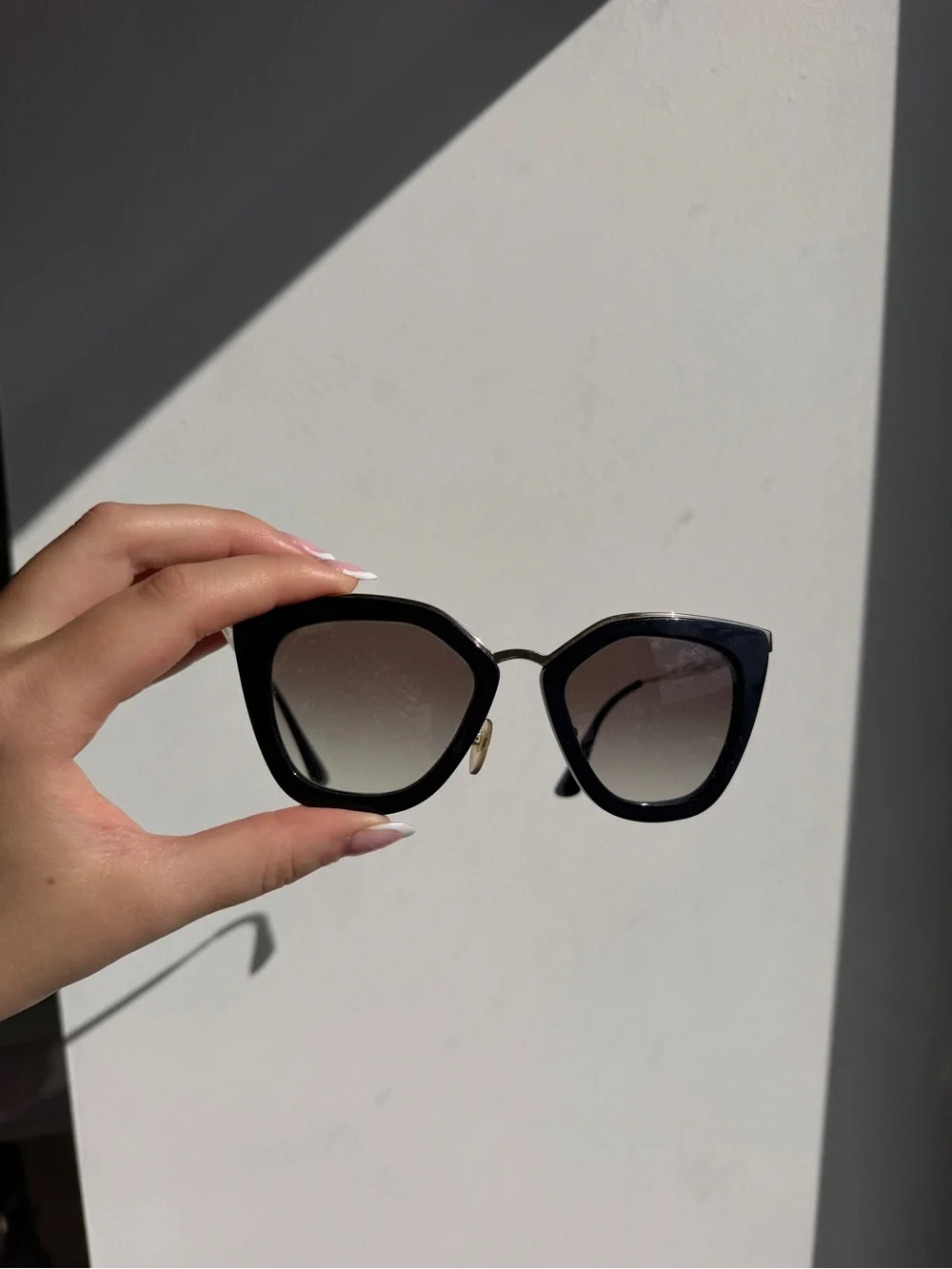 Prada Black Cat-Eye Sunglasses with Gradient Lenses